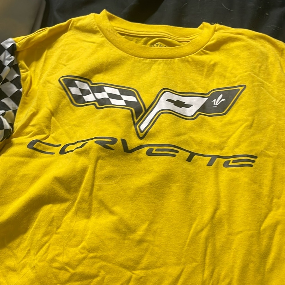 yellow cropped corvette shirt.
